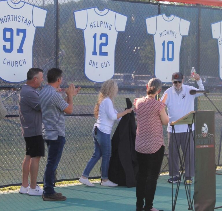 Bob Kelly’s #12 jersey retired at Horizon Field for his contributions to the community.